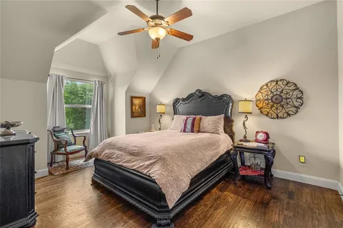 a bedroom with a bed and a cabinets