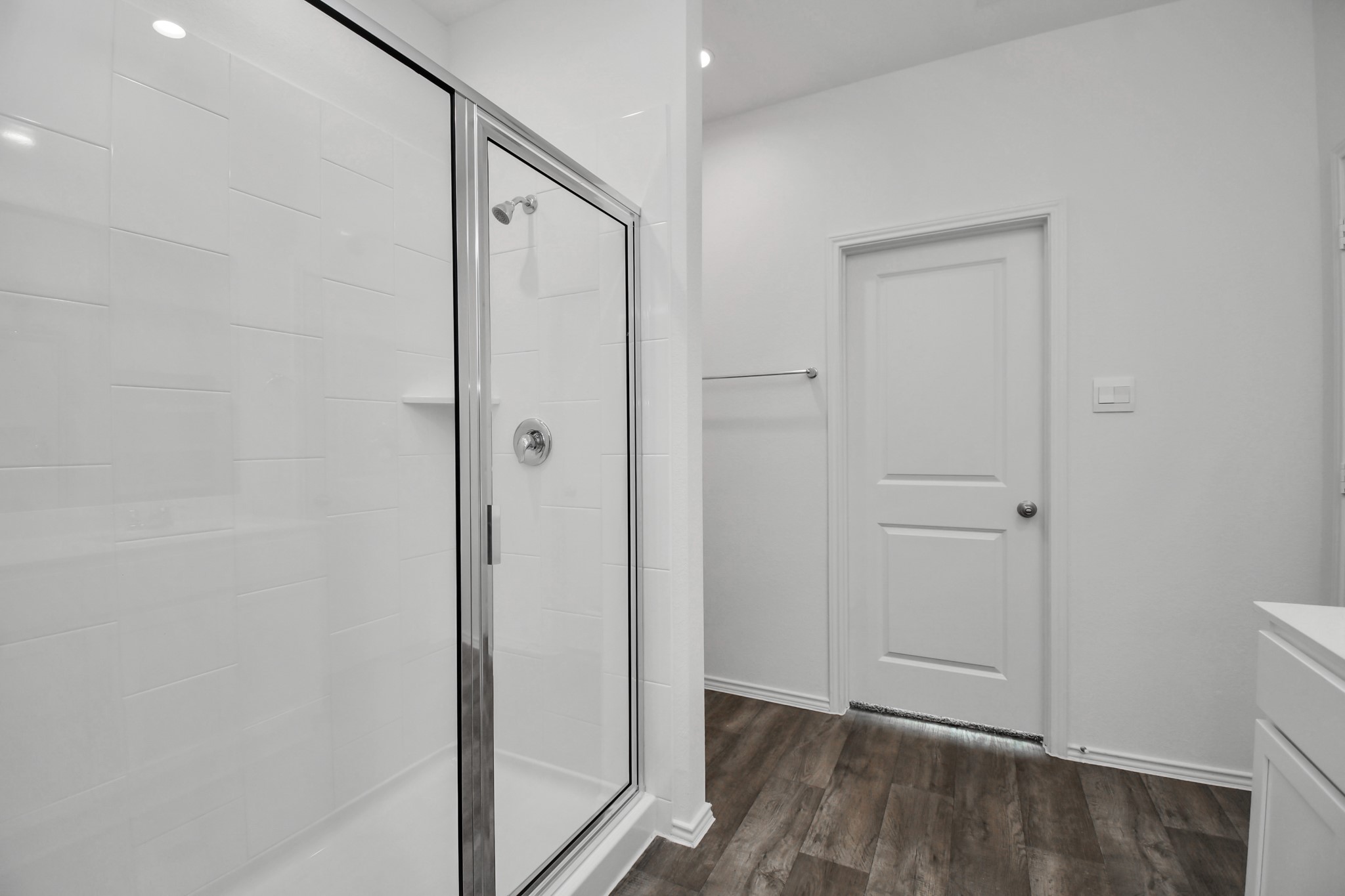 30903 Rockstock Road Fulshear, TX 77441 - Photo 24 of 42 a view of a hallway with wooden floor