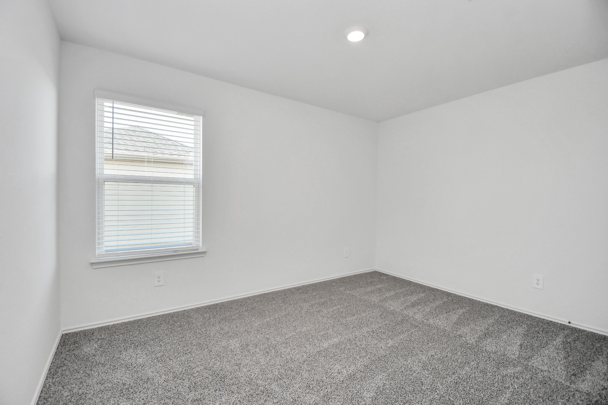 30903 Rockstock Road Fulshear, TX 77441 - Photo 26 of 42 an empty room with a window
