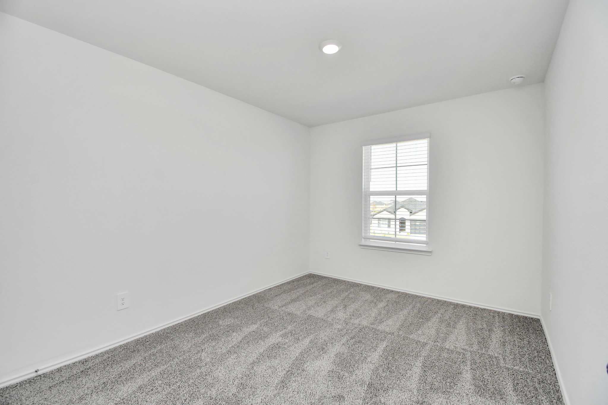 30903 Rockstock Road Fulshear, TX 77441 - Photo 32 of 42 an empty room with a window