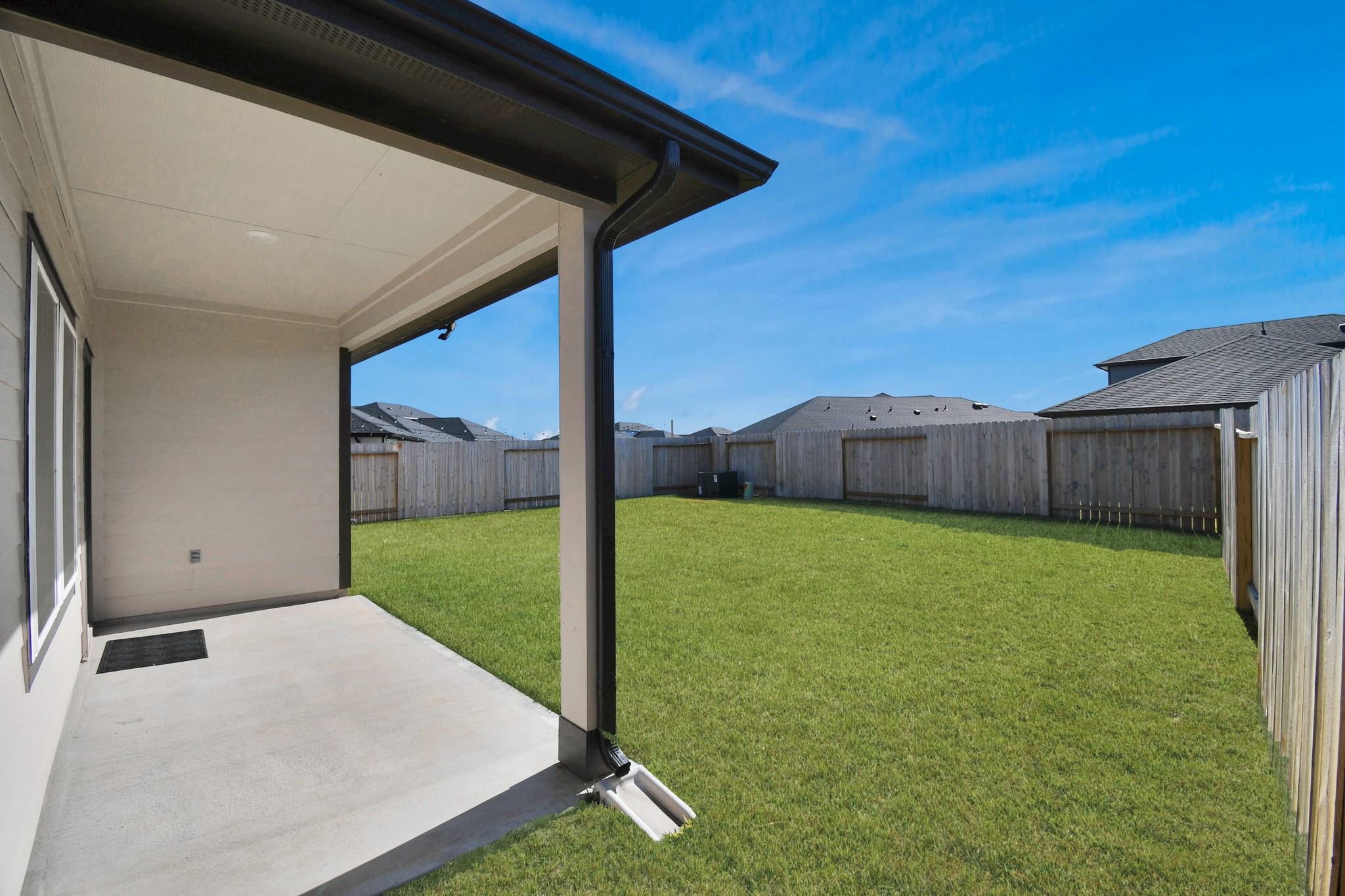 30903 Rockstock Road Fulshear, TX 77441 - Photo 38 of 42 a view of a backyard