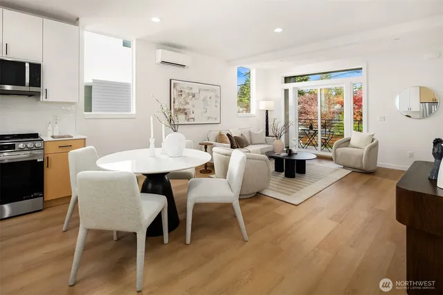 a view of a dining room with furniture window and outside view