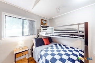 510 Cypress Ridge Road McQueeney, TX 78123 - Photo 28 of 32 a bedroom with a bed and a window