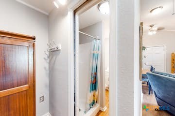 510 Cypress Ridge Road McQueeney, TX 78123 - Photo 29 of 32 a view of a bathroom from a hallway