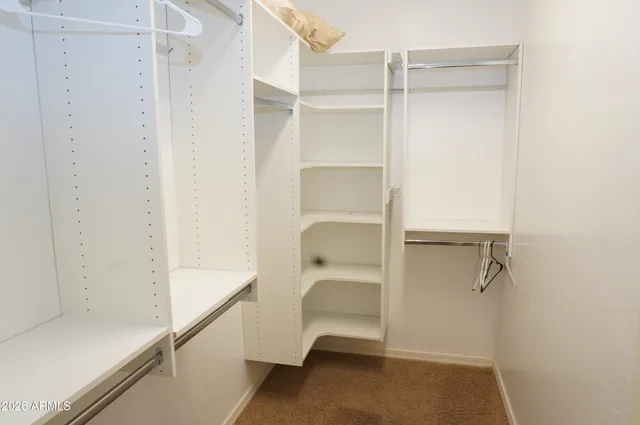 a bathroom with a tub and shower
