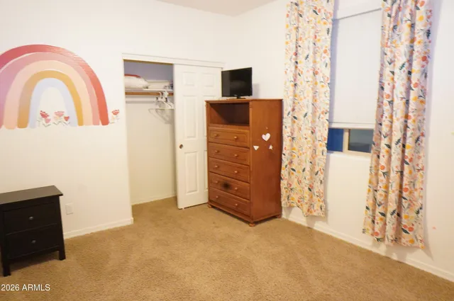 a view of a livingroom with closet