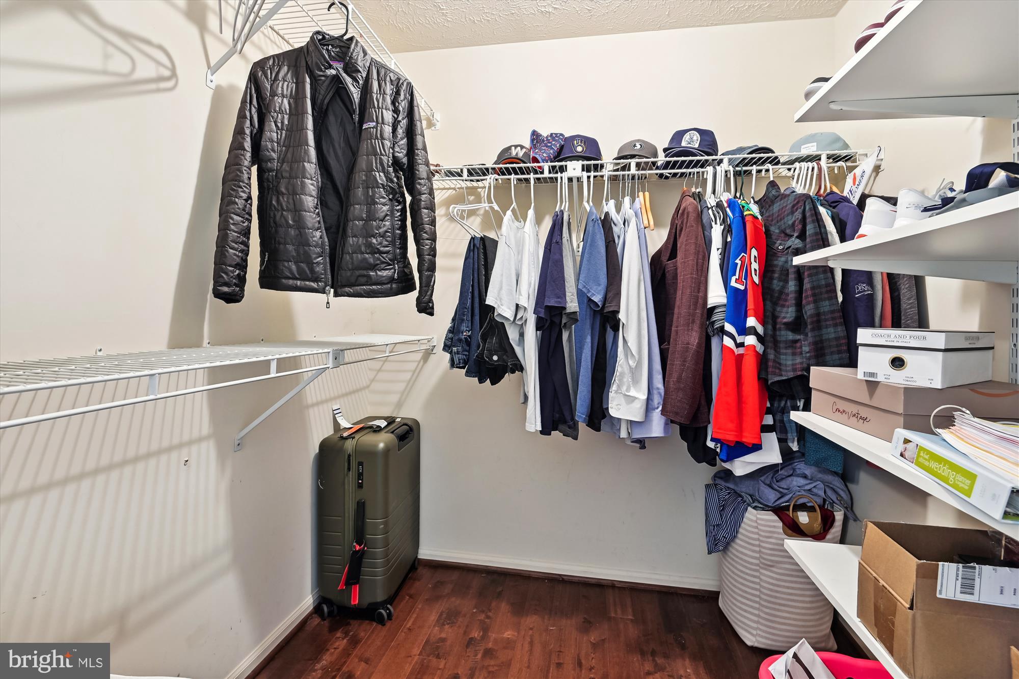 1517 Autumn Ridge Circle Reston, VA 20194 - Photo 33 of 37 a view of walk in closet with clothes and shoes