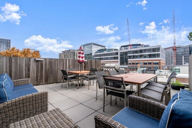 a view of a tables and chairs in patio