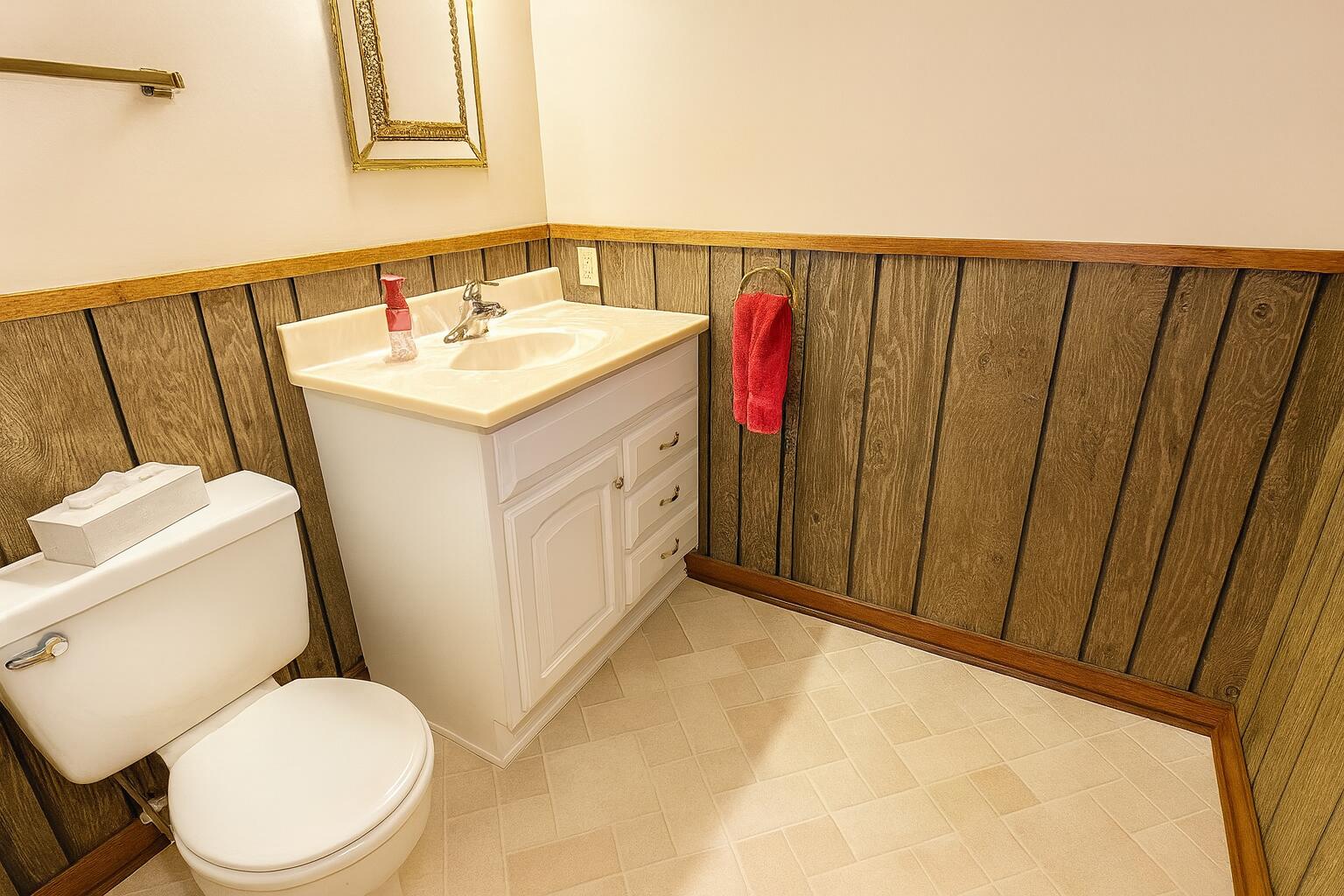 3631 Manor Drive Highland, IN 46322 - Photo 21 of 30 a bathroom with a sink toilet and vanity