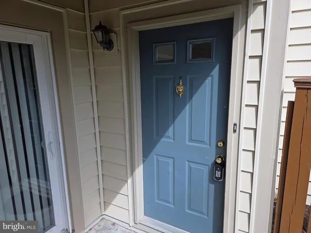 a view of a balcony with wooden floor