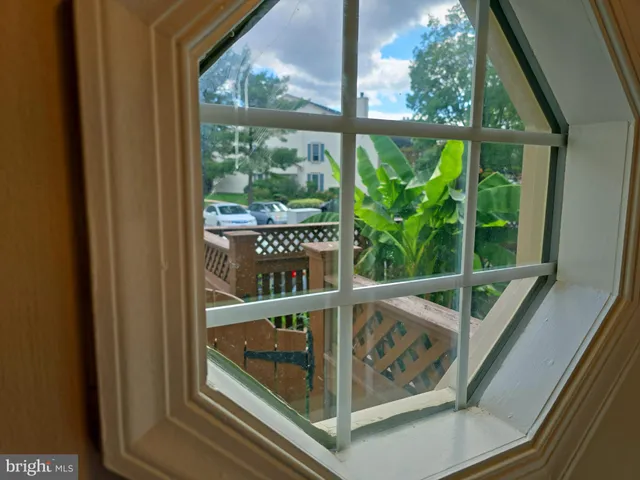 a living room with a wooden floor