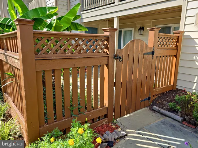 a view of a wooden fence