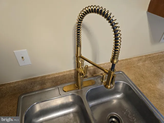 a bathroom with a sink and toilet