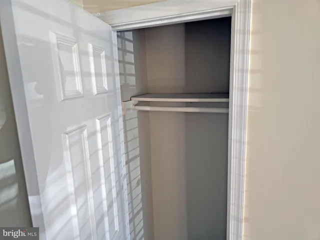 a sign that is in front of flowers