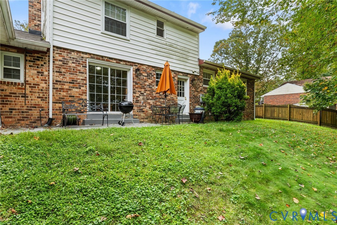 1040 Black Heath Road Midlothian, VA 23113 - Photo 24 of 26 Back of property with brick siding and a patio are