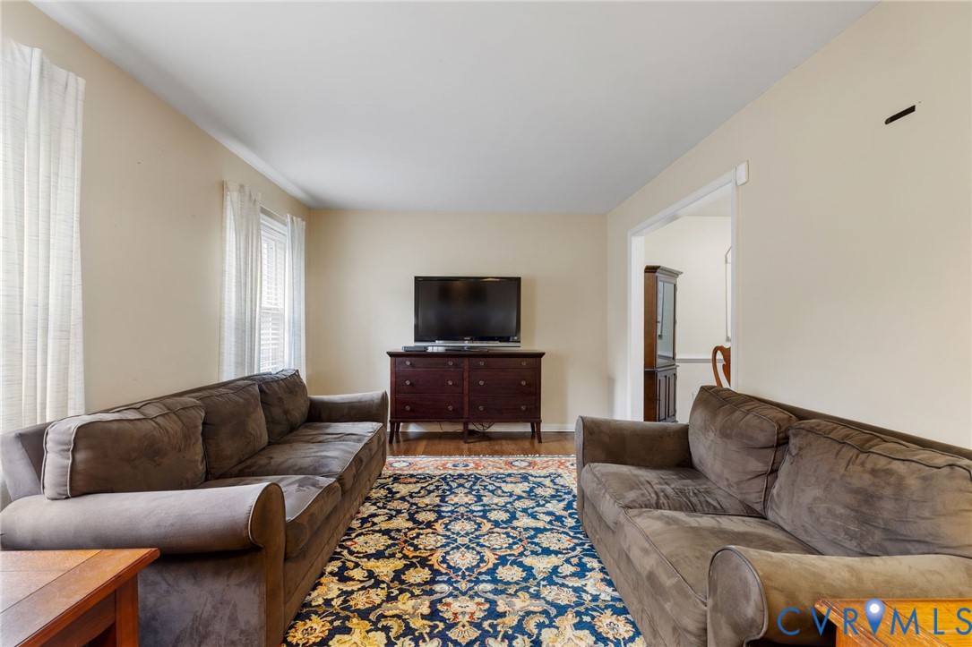 Living area featuring wood finished floors
