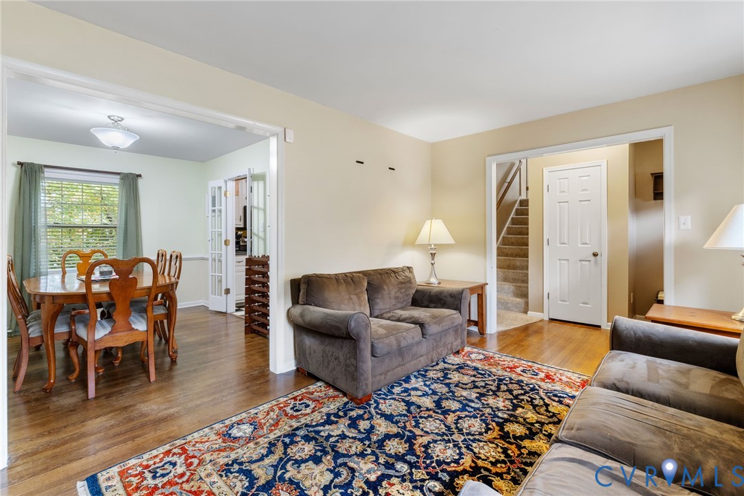 1040 Black Heath Road Midlothian, VA 23113 - Photo 9 of 26 Living area featuring wood finished floors and sta