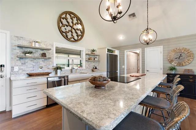 a view of outdoor space with wooden floor