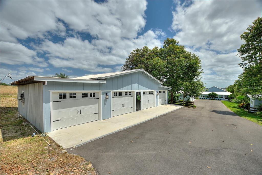 1395 South Lake Reedy Boulevard Frostproof, FL 33843 - Photo 37 of 81 front view of house with a yard and garage