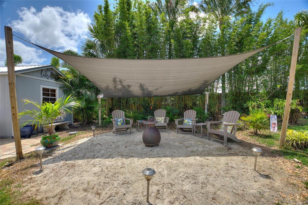 1395 South Lake Reedy Boulevard Frostproof, FL 33843 - Photo 57 of 81 a view of a patio with chairs and plants