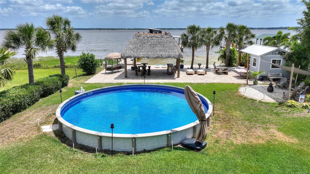 1395 South Lake Reedy Boulevard Frostproof, FL 33843 - Photo 67 of 81 an outdoor space with pool and furniture