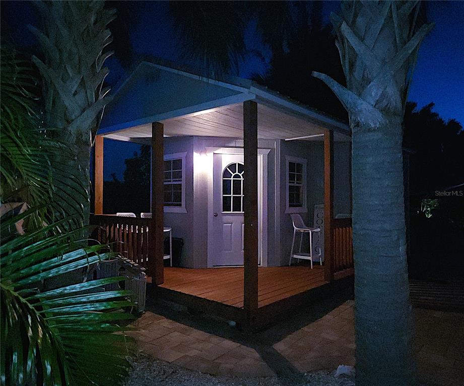 1395 South Lake Reedy Boulevard Frostproof, FL 33843 - Photo 73 of 81 a view of living room kitchen outdoor space and deck