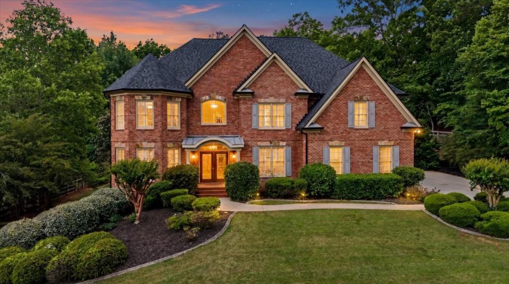 122 Ridge View Drive Ball Ground, GA 30107 - Photo 1 of 84 a front view of a house with a yard
