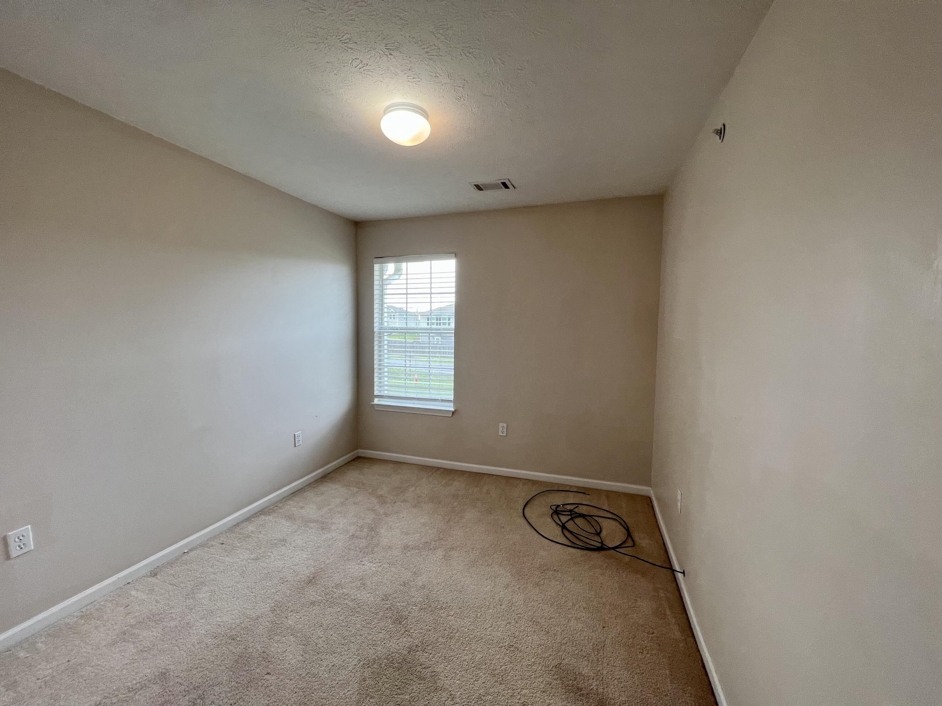 308 Crooked Pine Trail Crestview, FL 32539 - Photo 11 of 20 a view of a room with window