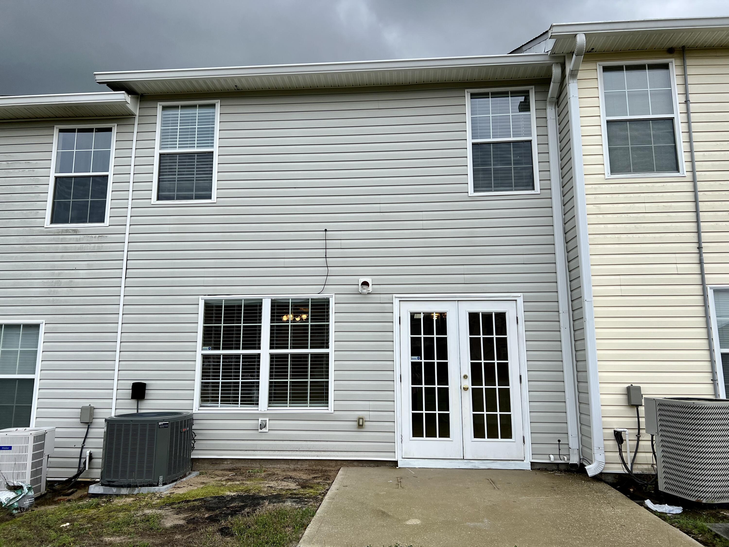 308 Crooked Pine Trail Crestview, FL 32539 - Photo 20 of 20 a front view of a house with a large window