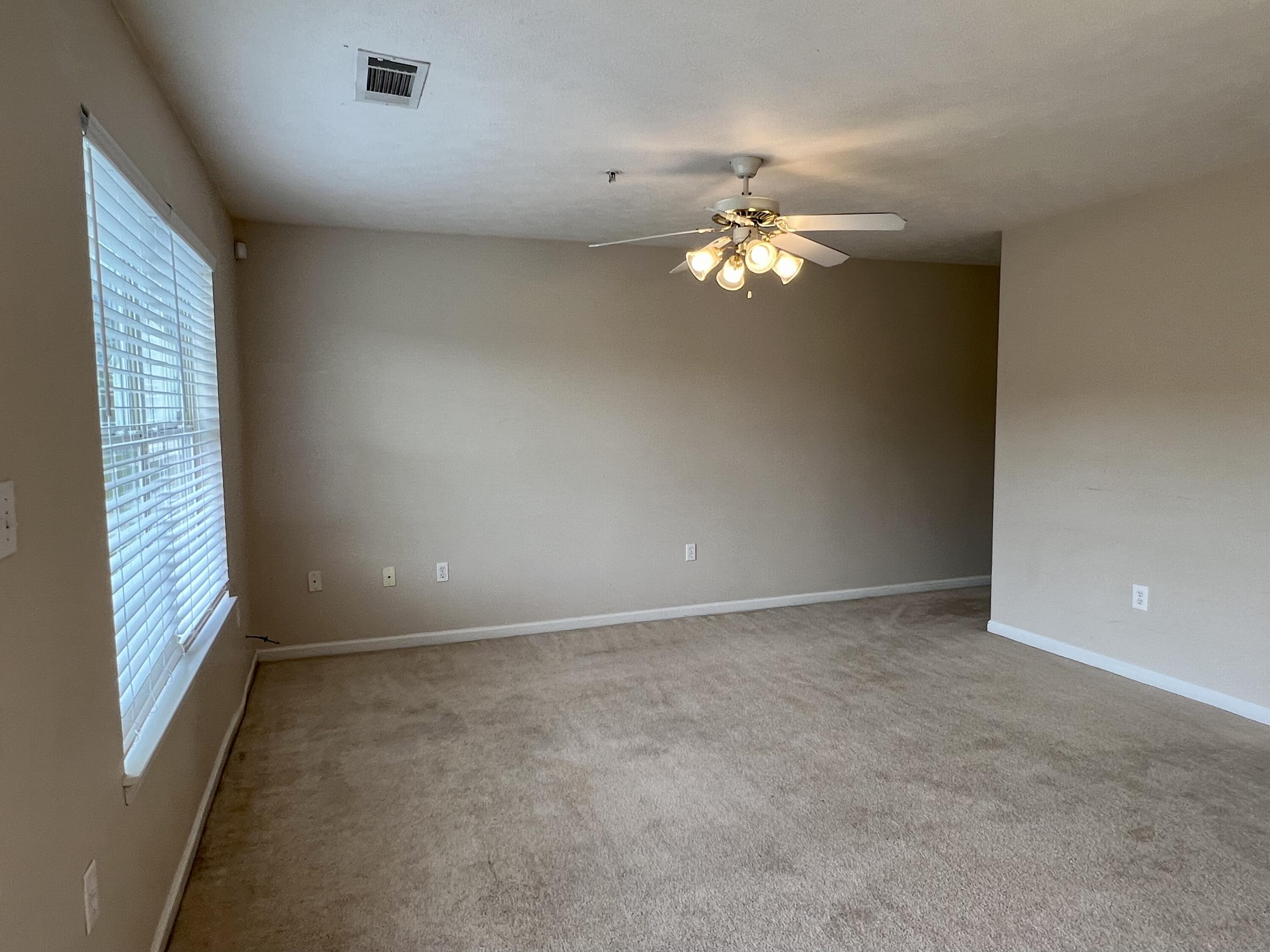 308 Crooked Pine Trail Crestview, FL 32539 - Photo 2 of 20 a view of a chandelier fan and fire place