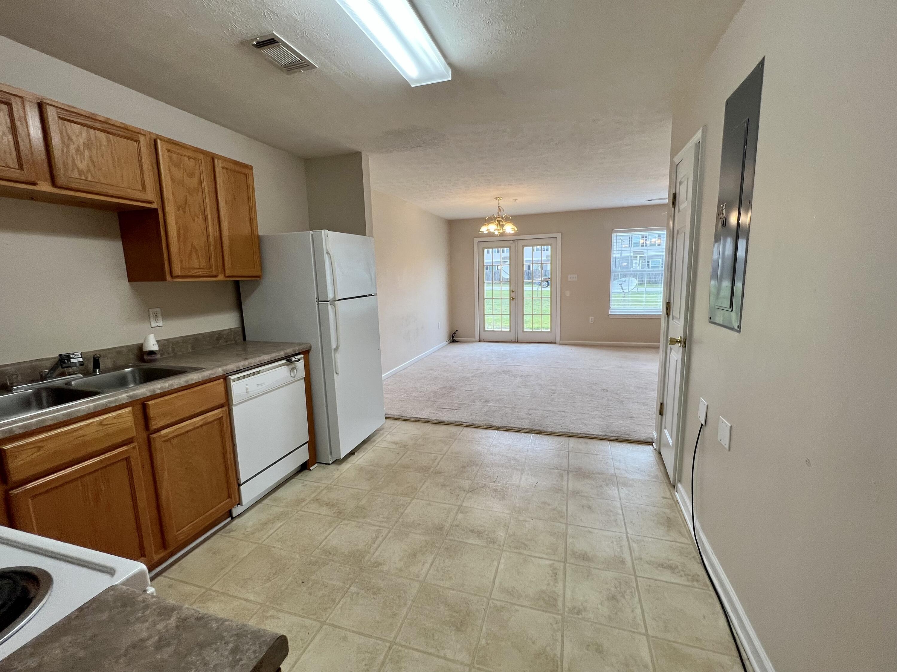 308 Crooked Pine Trail Crestview, FL 32539 - Photo 6 of 20 a open kitchen with sink and cabinets