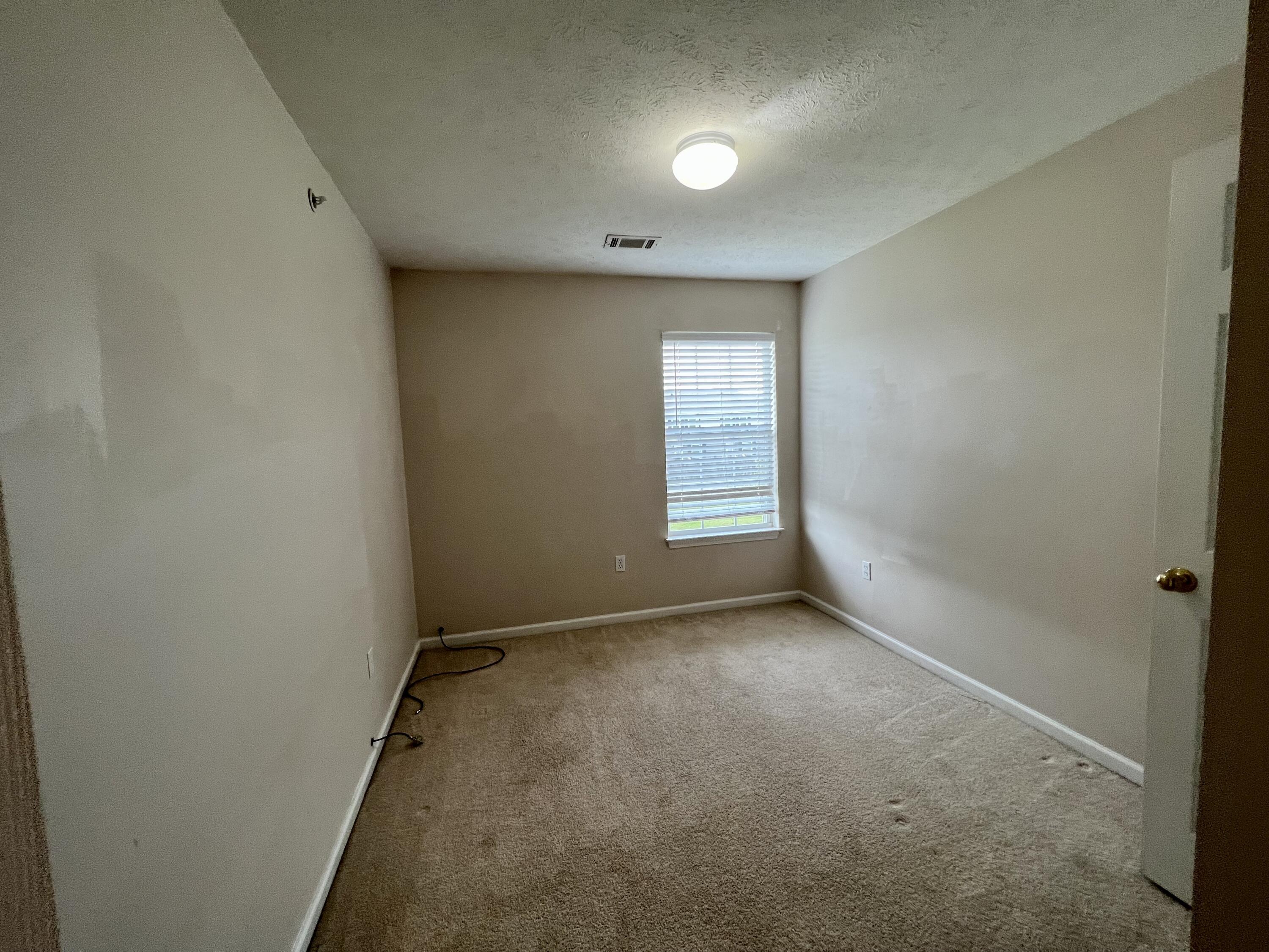 308 Crooked Pine Trail Crestview, FL 32539 - Photo 10 of 20 an empty room with windows