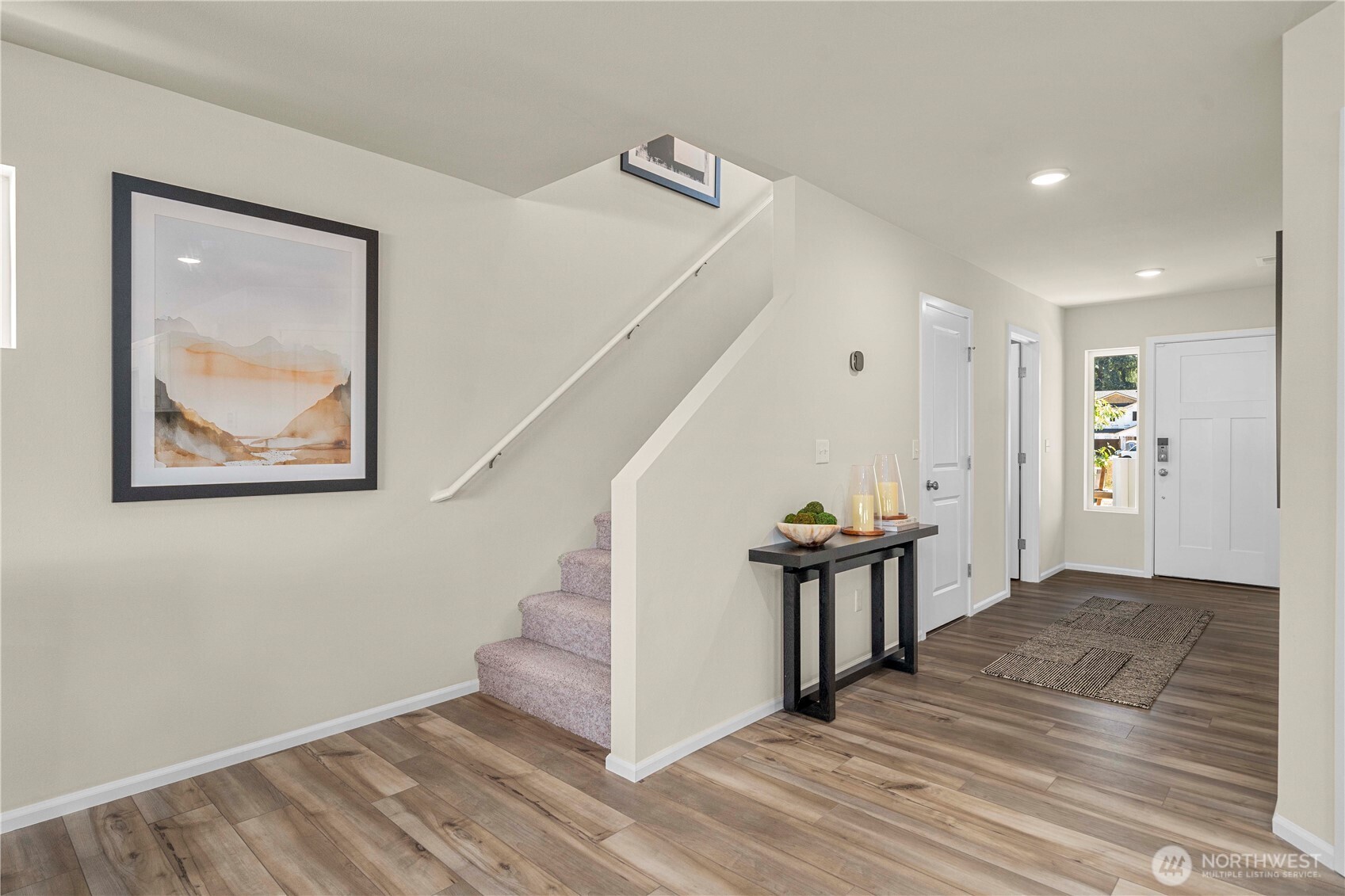 13430 323rd Avenue Southeast Sultan, WA 98294 - Photo 20 of 36 a view of a hallway with wooden floor and staircase