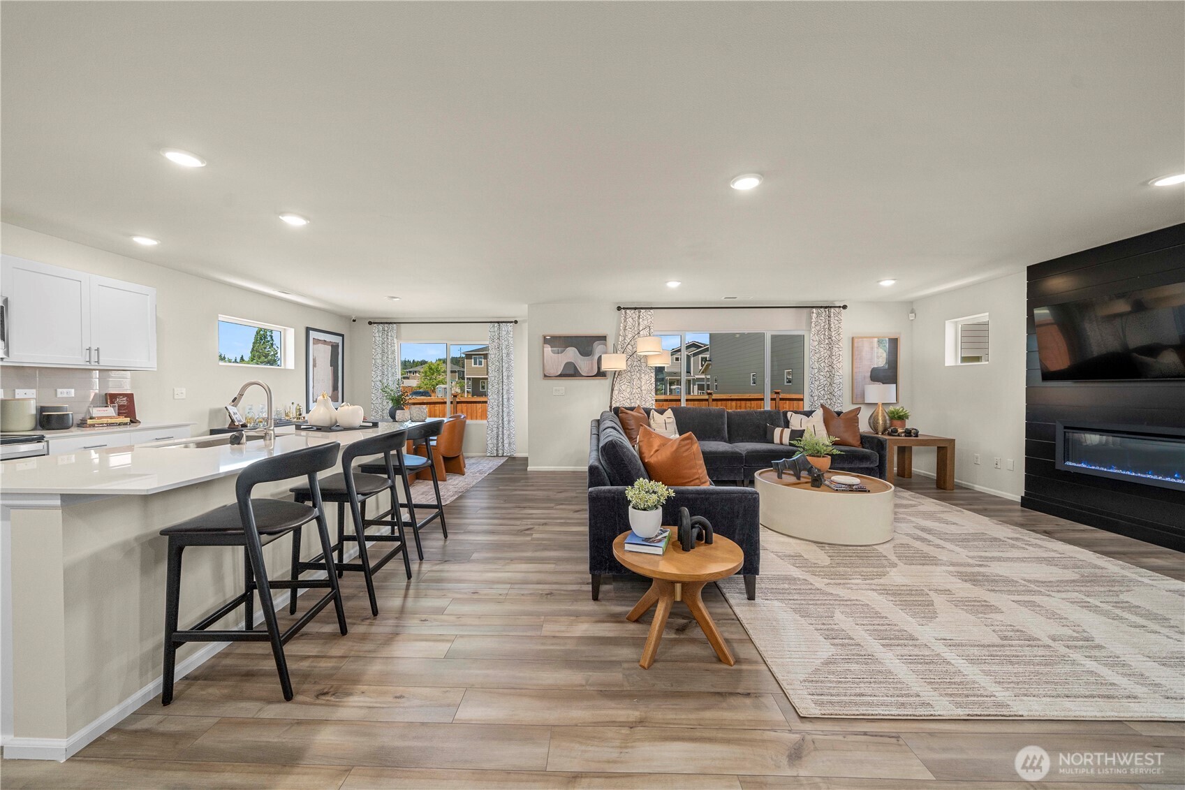 13430 323rd Avenue Southeast Sultan, WA 98294 - Photo 21 of 36 a living room with lots of furniture and kitchen view