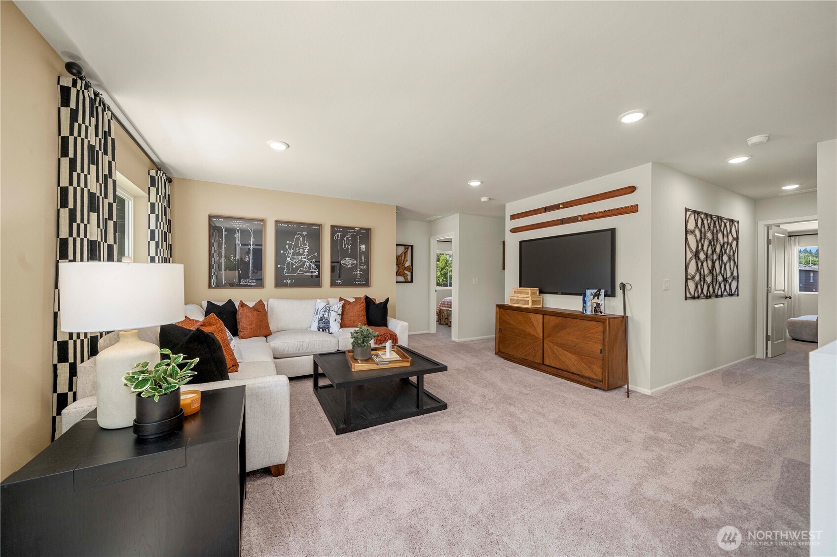 13430 323rd Avenue Southeast Sultan, WA 98294 - Photo 22 of 36 a living room with furniture and a flat screen tv