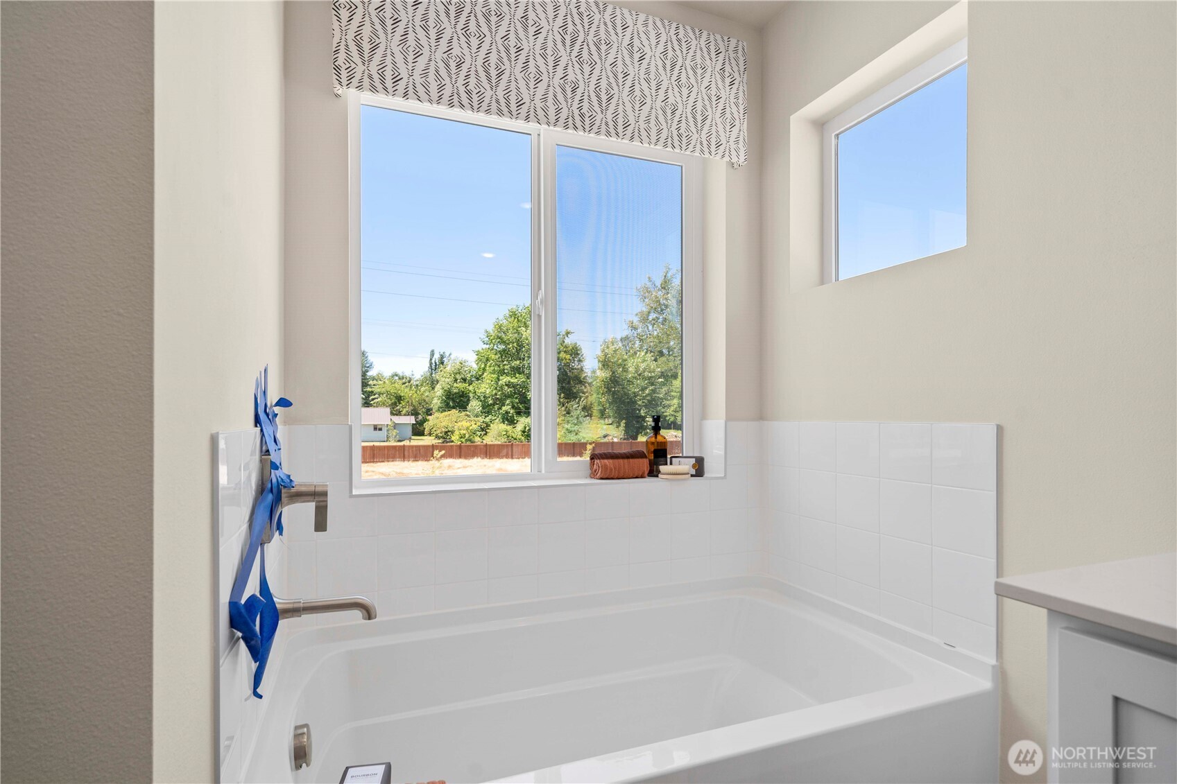 13430 323rd Avenue Southeast Sultan, WA 98294 - Photo 33 of 36 a white bath tub sitting next to a window