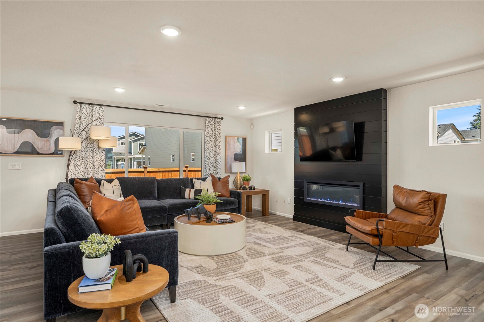 13430 323rd Avenue Southeast Sultan, WA 98294 - Photo 10 of 36 a living room with furniture and a flat screen tv