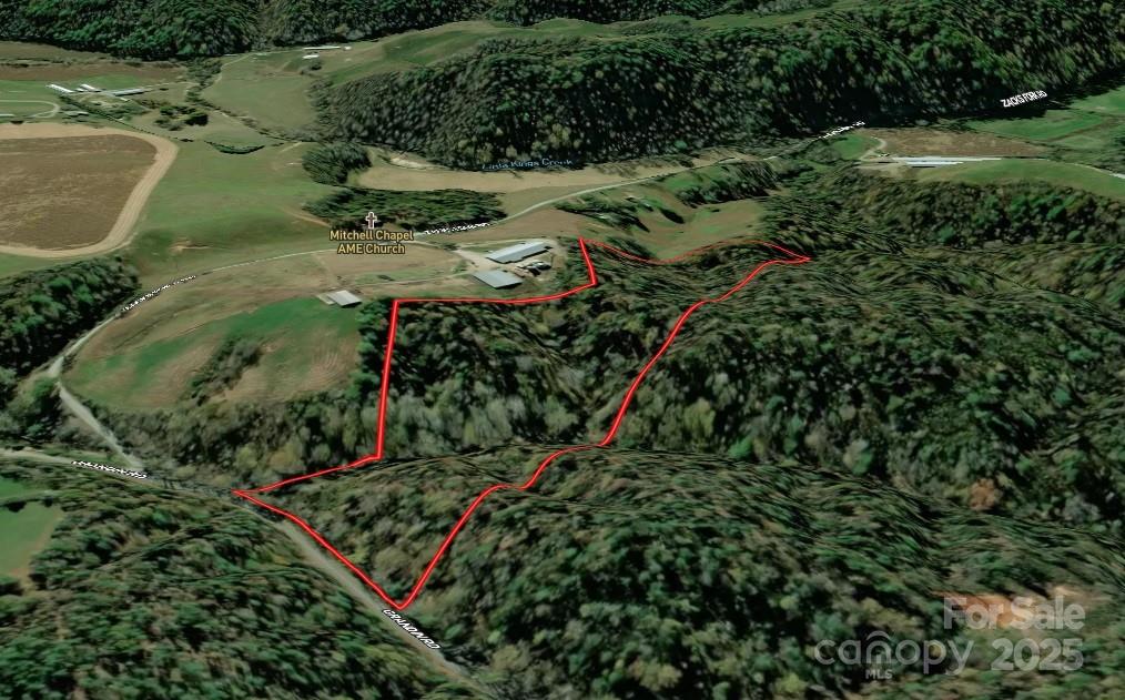 0 Grandin Road, Unit 3 Lenoir, NC 28645 - Photo 8 of 11 an aerial view of a golf course with a lake view