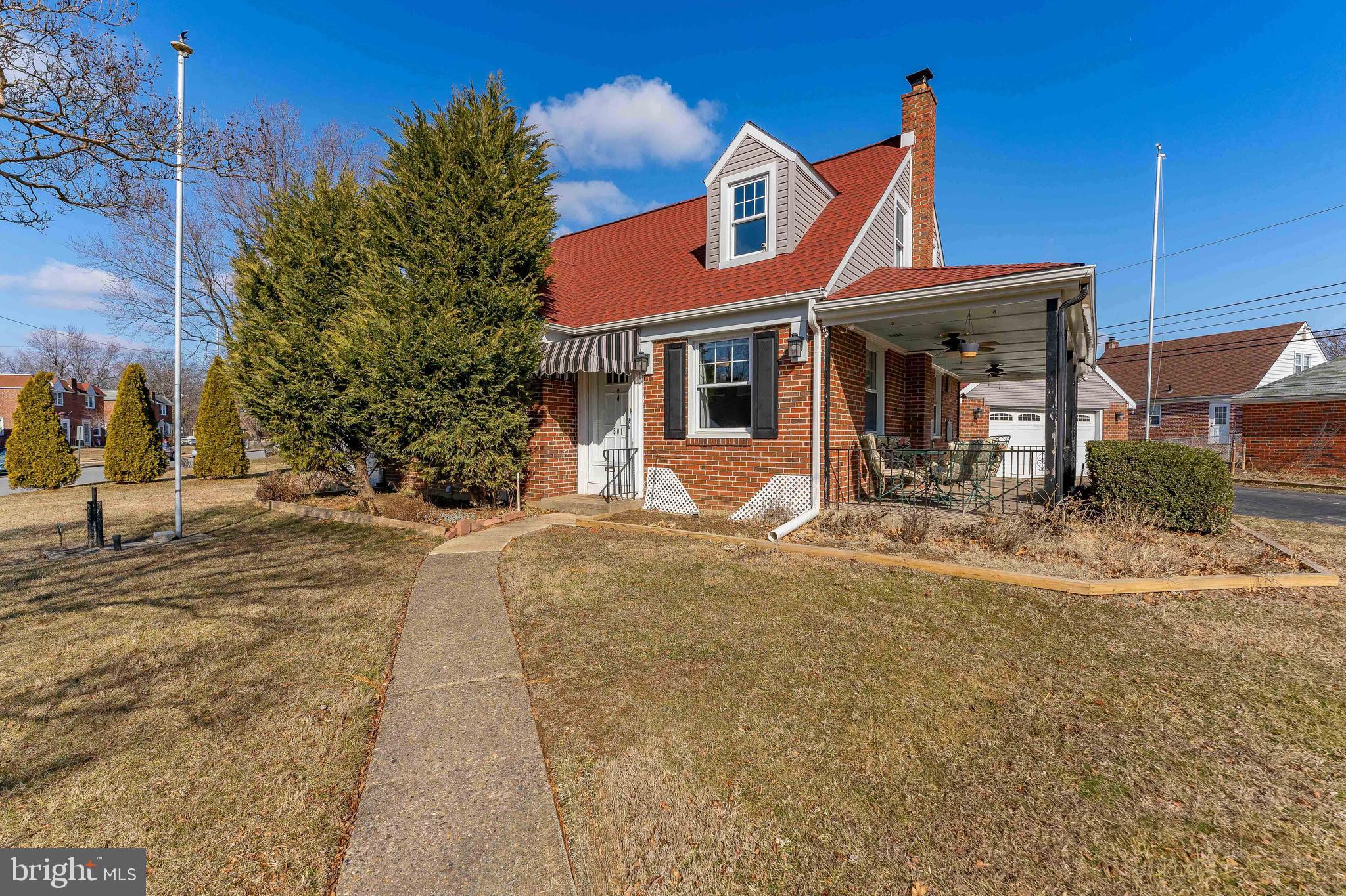501 W Road Ridley Park, PA 19078 - Photo 1 of 29 a front view of a house with a yard