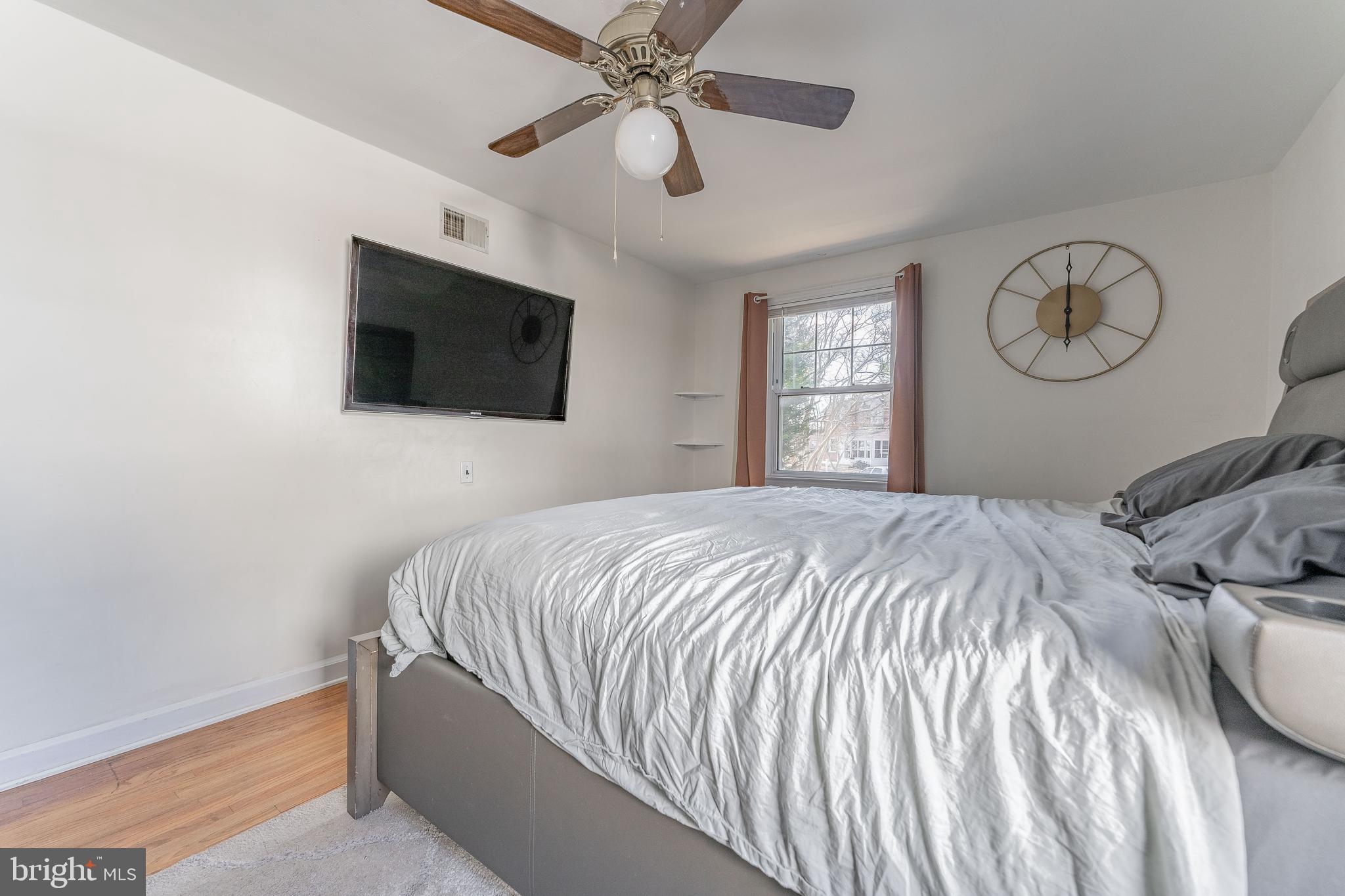 501 W Road Ridley Park, PA 19078 - Photo 13 of 29 a bedroom with a bed and a flat screen tv