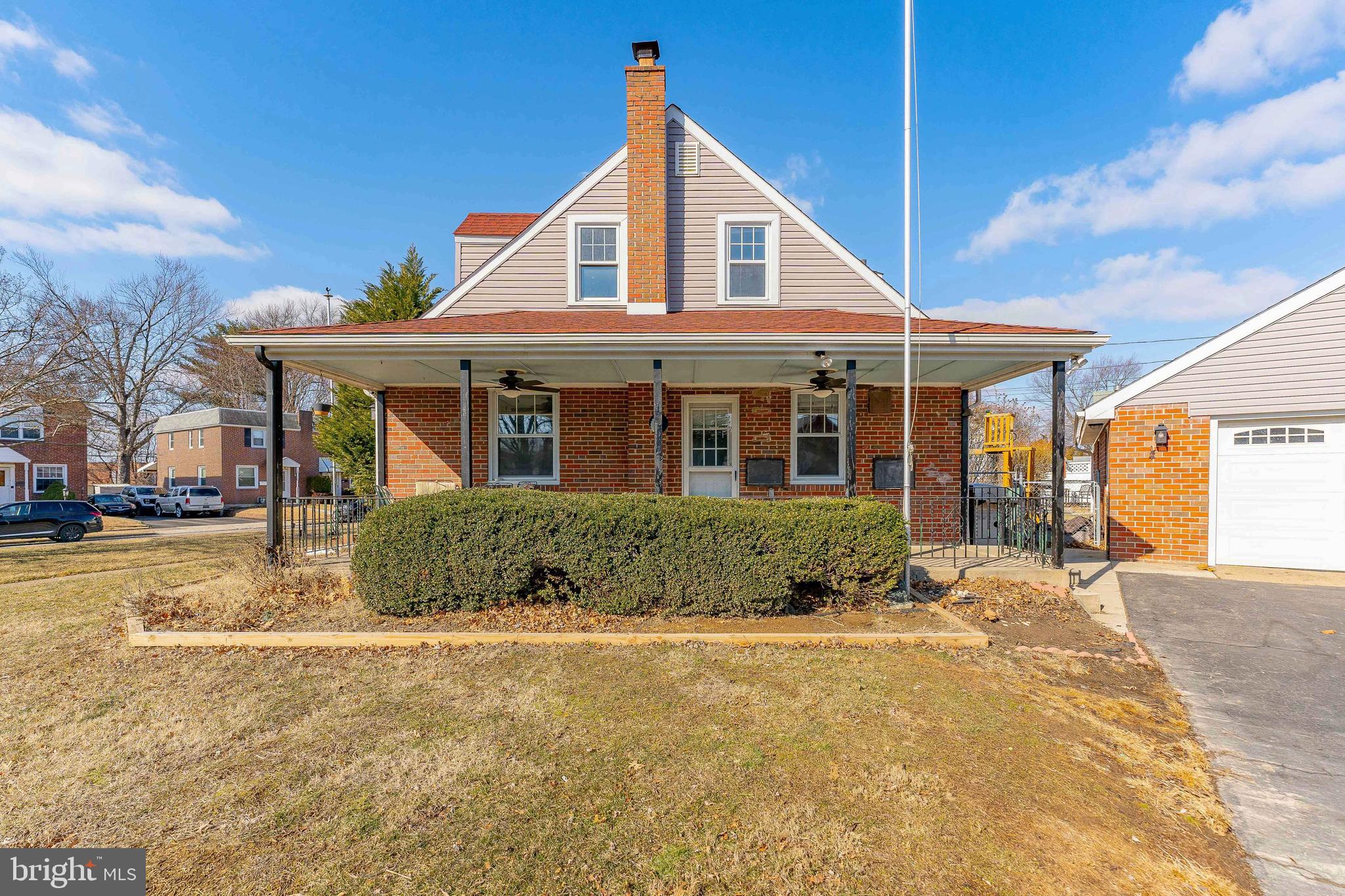 501 W Road Ridley Park, PA 19078 - Photo 3 of 29 a front view of a house with a yard