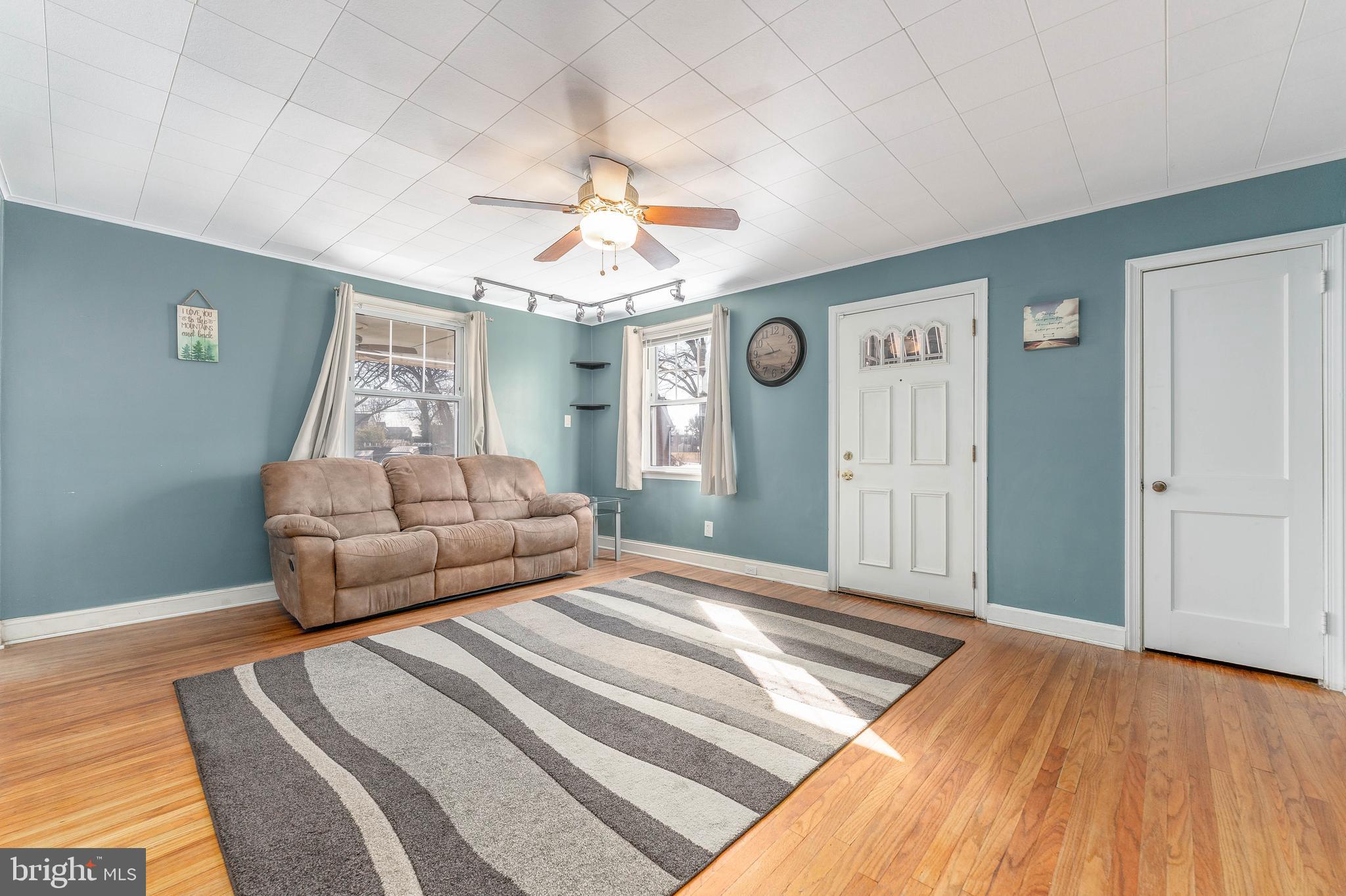 501 W Road Ridley Park, PA 19078 - Photo 6 of 29 a bedroom with a bed and a chandelier