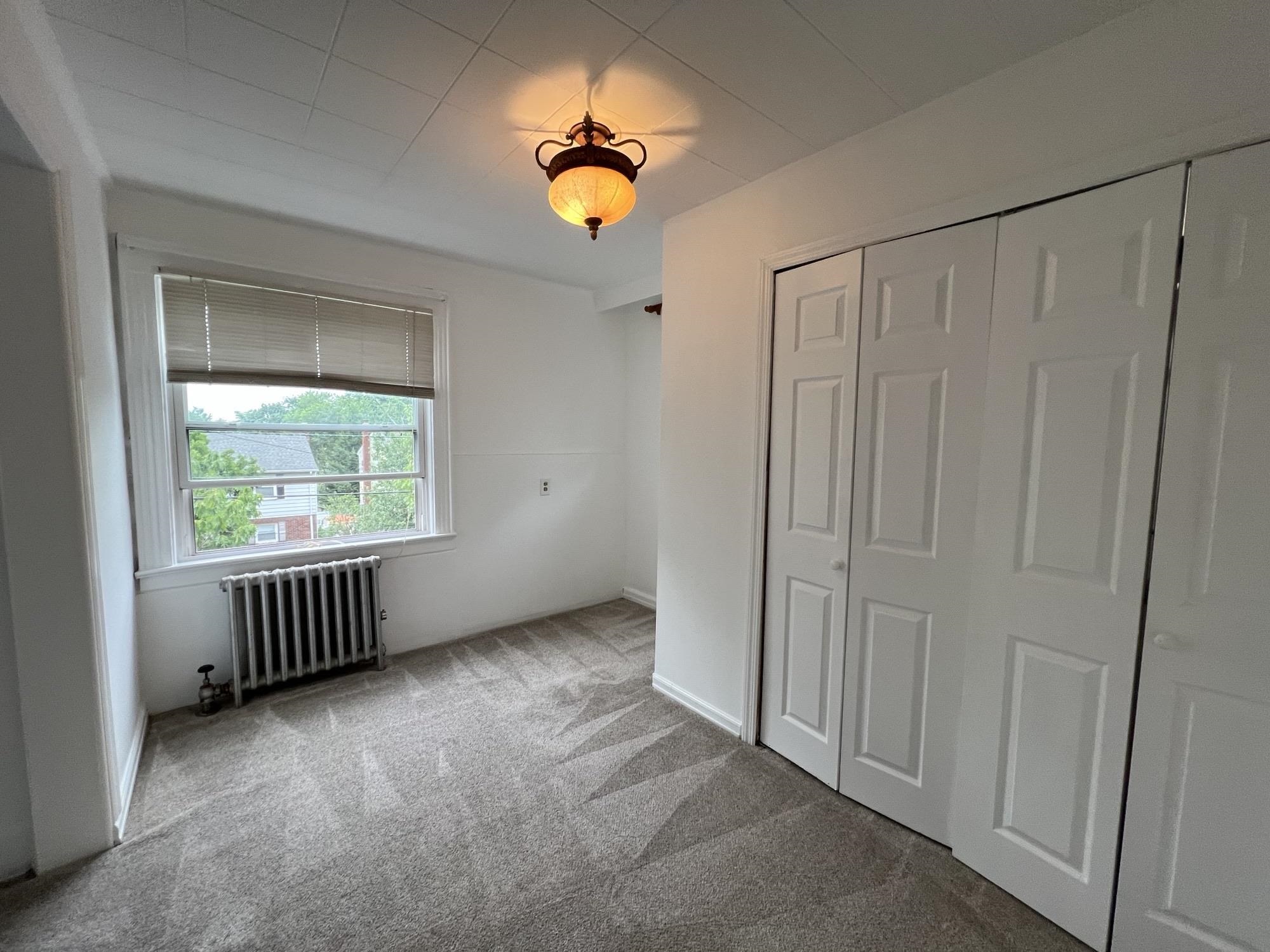 1 8th Street Ridgefield Park, NJ 07660 - Photo 17 of 27 a view of an empty room with a window
