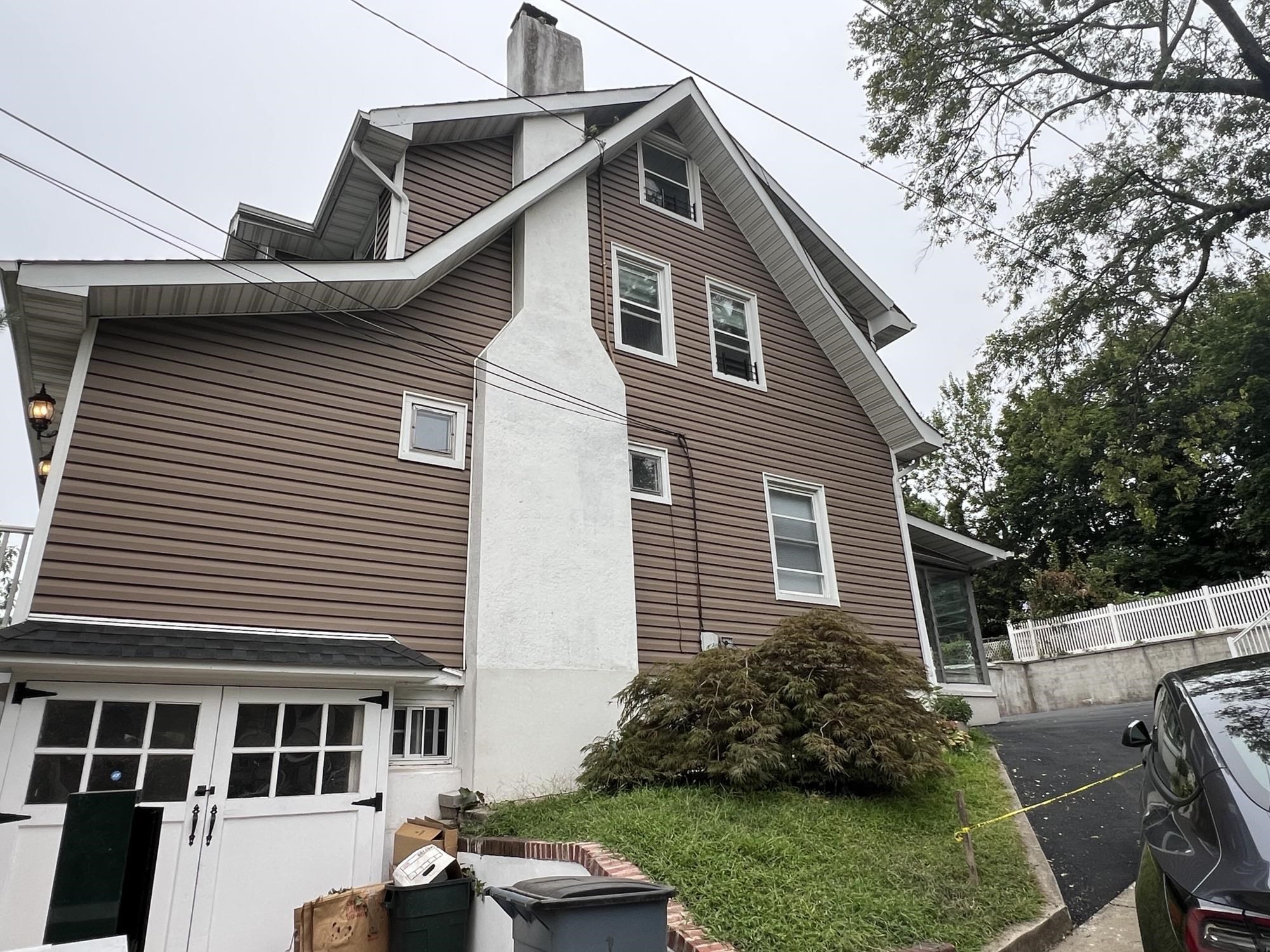 1 8th Street Ridgefield Park, NJ 07660 - Photo 2 of 27 a front view of a house with a yard