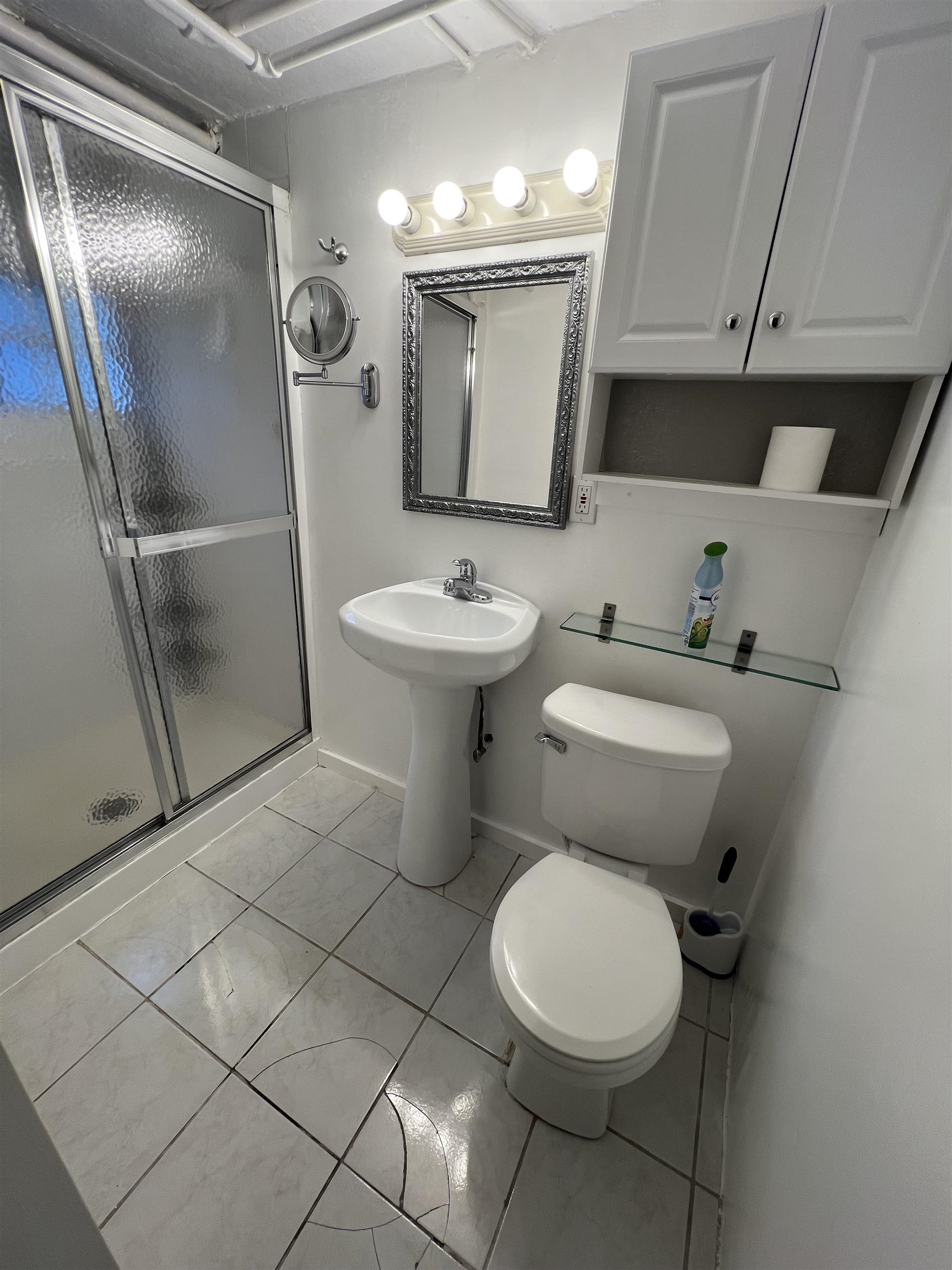 1 8th Street Ridgefield Park, NJ 07660 - Photo 21 of 27 a bathroom with a toilet sink and mirror