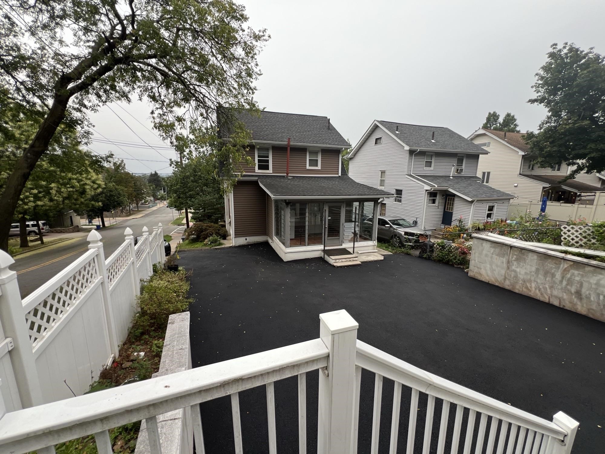 1 8th Street Ridgefield Park, NJ 07660 - Photo 5 of 27 a balcony view with couple of chairs