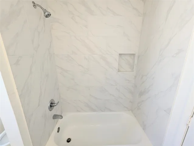 a bathroom with a bathtub