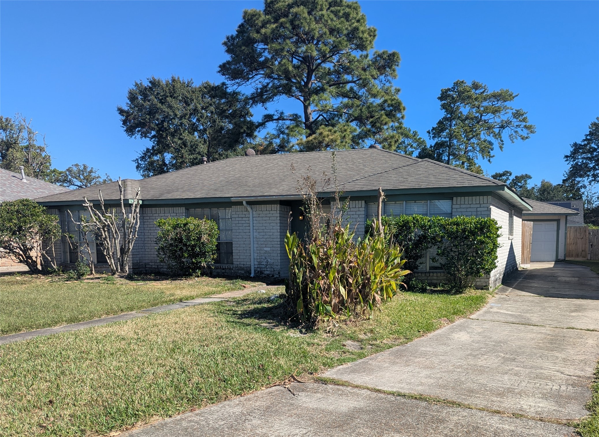 17602 Crestline Road Humble, TX 77396 - Photo 2 of 27 a front view of a house with a yard