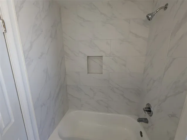 a close up of a bathtub