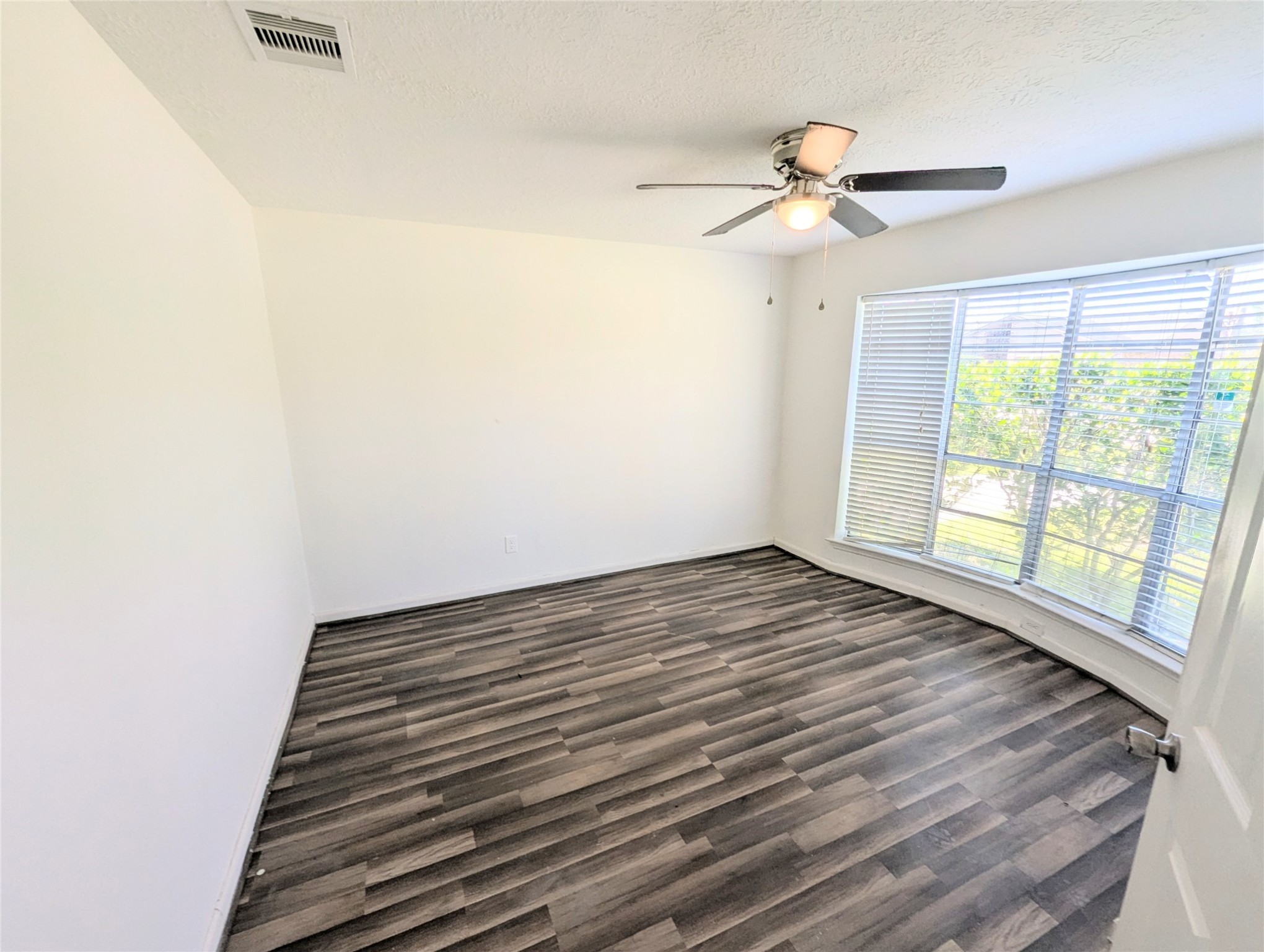 17602 Crestline Road Humble, TX 77396 - Photo 5 of 27 a view of an empty room and window